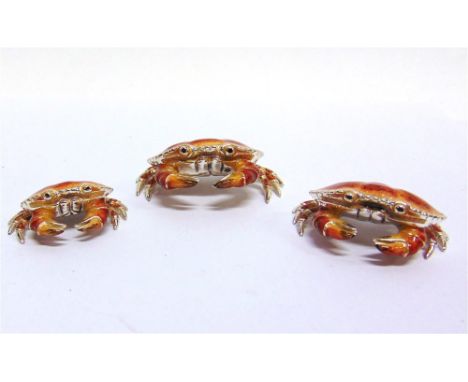 SATURNO, ITALY: A GRADUATED SET OF THREE SILVER AND ENAMEL CRABS,  the largest approx 55mm wide