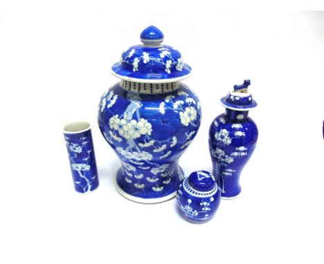 A LARGE CHINESE BALUSTER SHAPED VASE AND COVER,  underglaze blue painted decoration of prunus blossom on a cracked ice ground