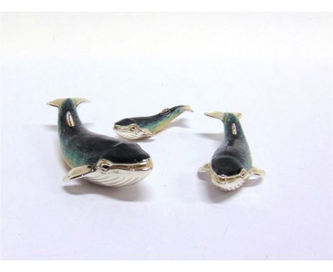 SATURNO, ITALY: A GRADUATED SET OF THREE SILVER AND ENAMEL WHALES,  the largest approx 85mm nose to tail