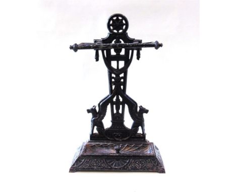 A VICTORIAN CAST IRON STICK STAND  with removable drip tray, diamond registration marks, 46cm wide 22cm deep 75cm high