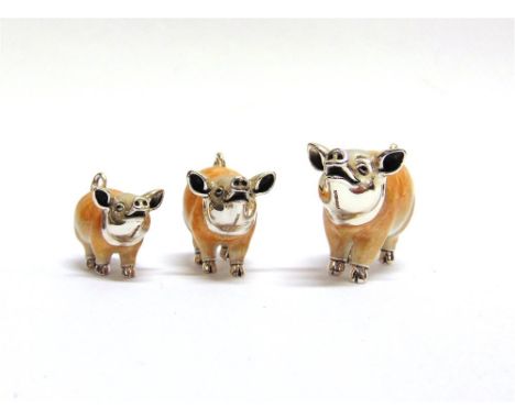 SATURNO, ITALY: A GRADUATED SET OF THREE SILVER AND ENAMEL PIGS,  the largest approx 55mm nose to tail