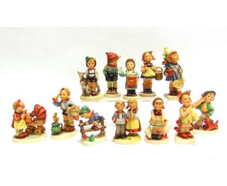 A COLLECTION OF TWELVE HUMMEL/GOEBEL FIGURES,  including 'Congratulations', 'Birthday Serenade', 'Strolling Along', 'Be Patie