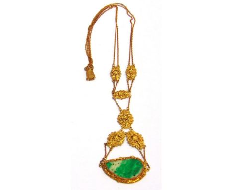 A CARVED JADE PANEL PENDANT to a filigree mount and back chain with filigree spacers, possibly Chinese 