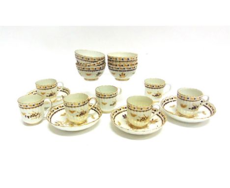 A COLLECTION OF LATE 18TH CENTURY TEAWARES,  of fluted form with gilt decoration, underglaze blue crescent mark, probably Wor