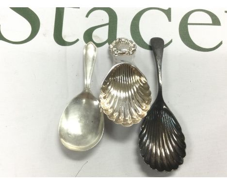 Three silver caddy spoons. Shipping category A.