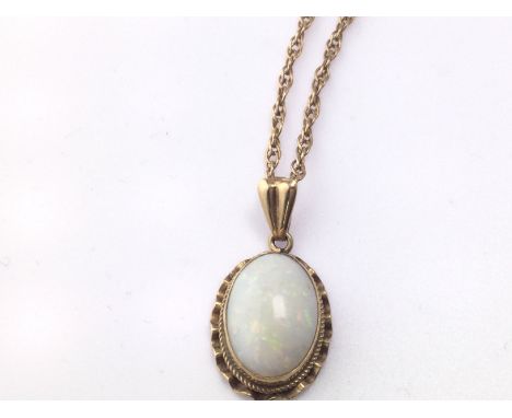 A 9ct gold chain with opal pendant. Total weight 4.42g