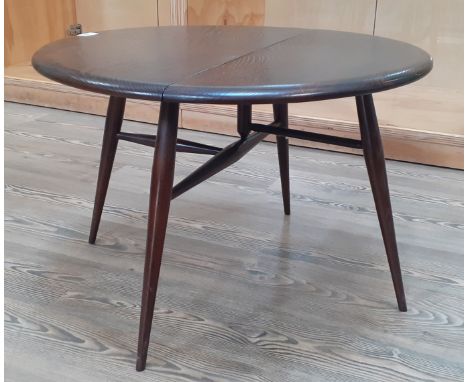 1960s Ercol dark elm drop leaf coffee table, model 308, height 40cm, width 62cm.