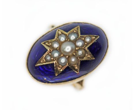 A late Georgian blue enamel and seed pearl cabochon ring, unmarked, the bezel setting measuring approx. 20mm x 14mm, gross wt