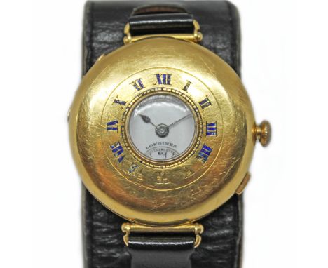 A Longines 18ct gold half hunter trench type wristwatch, circa 1920s, diam. 34mm, signed white enamel dial with Roman numeral