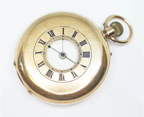 A late 19th century 12ct gold keyless half hunter pocket watch, diam. 52mm, crown wind and adjust, outer case with blue ename