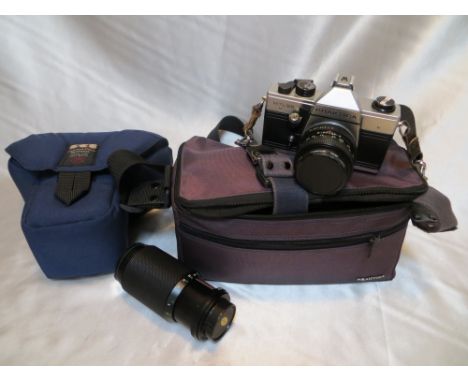 Praktica MTL 50 camera, with 1x Pentacon lens, 2x Hanimex lenses, 9x filters, 1x flash, 1x rubber lens hood and 2x carry case