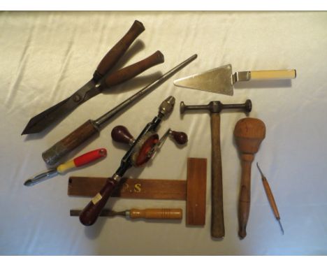 10 assorted vintage tools.