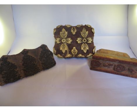 3x wooden print blocks.