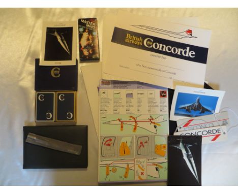 Assorted Concorde memorabilia, including safety card, playing cards, pen, address book, post cards, certificates, menus & min