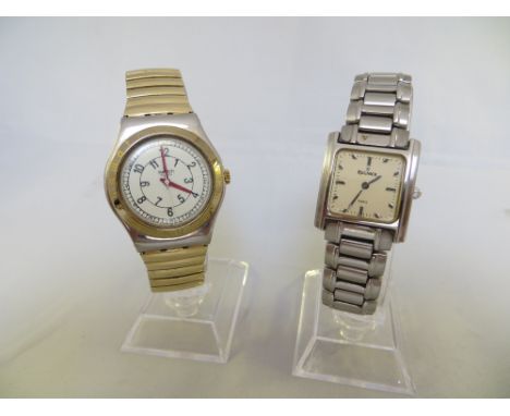 Original Swatch watch and a ladies Regnier watch. Both quartz.