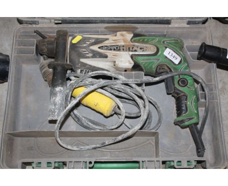 A Hitachi DH24PC3 110v rotary hammer drill in fitted plastic case