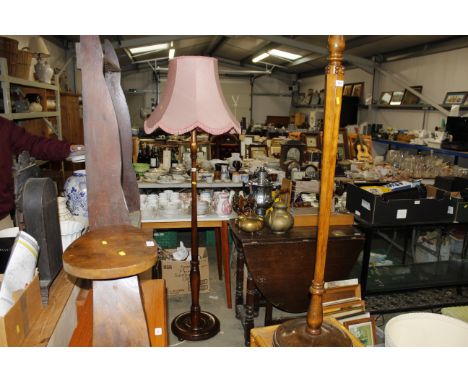 An oak standard lamp and shade