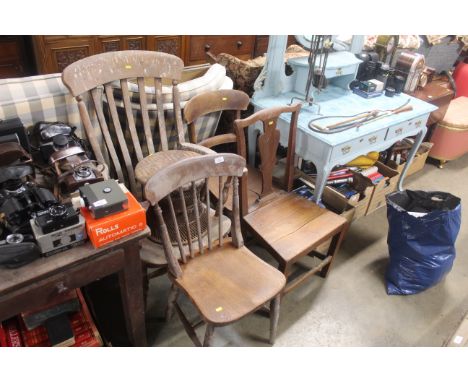 A slat back carver chair, a stick back chair, a bar back chair, one other chair and a stool