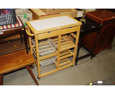 A tile topped kitchen trolley