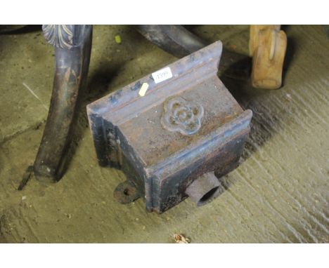 A painted cast iron rain hopper with patterned motif