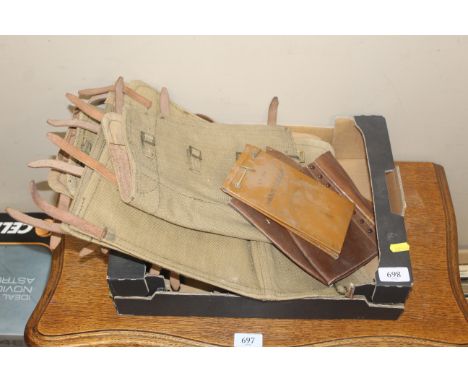 A box containing Aircraft recognition book and box of leather and other spats