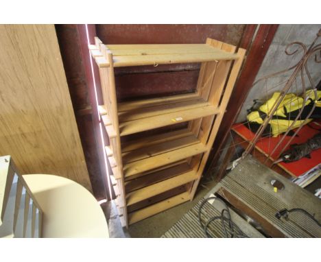 A pine five tier shelf unit