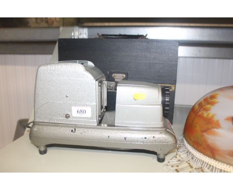 A slide projector with fitted case