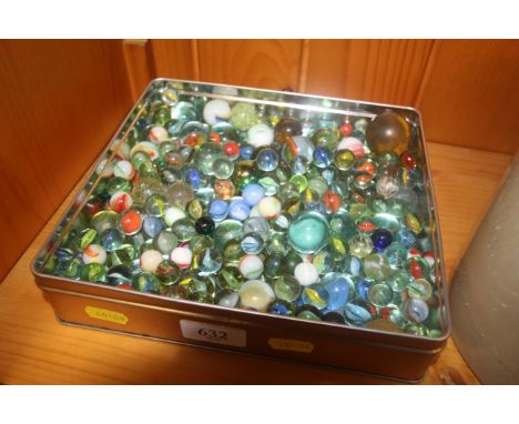 A tin of vintage glass and other marbles