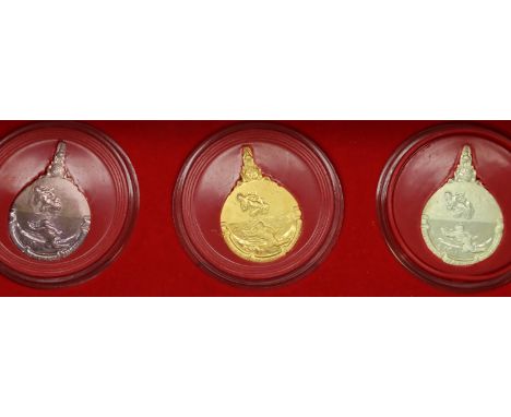 Three boxed Thai medals, gold, silver and bronze. P&amp;P Group 1 (£14+VAT for the first lot and £1+VAT for subsequent lots) 