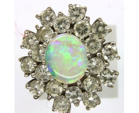 Good platinum opal and diamond ring, size N, 8.3g. P&amp;P Group 1 (£14+VAT for the first lot and £1+VAT for subsequent lots)