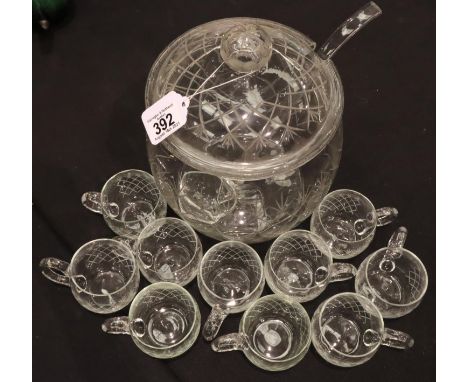 An early 20th century Irish cut glass punch bowl with cover, glass ladle and ten punch cups. Not available for in-house P&amp