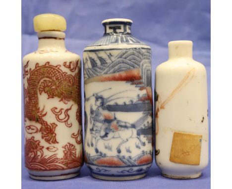 Three 18th-19th century Chinese ceramic snuff bottles, each of cylindrical form. The shortest with figural design H: 69mm has
