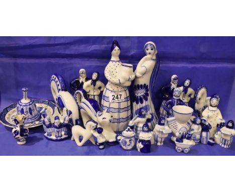 Collection of Russian Folk ceramic figurines and a piece of Delftware. P&amp;P Group 3 (£25+VAT for the first lot and £5+VAT 