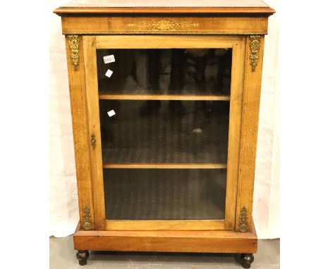 A Regency walnut pier cabinet/bookcase with key, the cabinet belonged to Mrs Maria McNeil who was five times the Mayoress of 