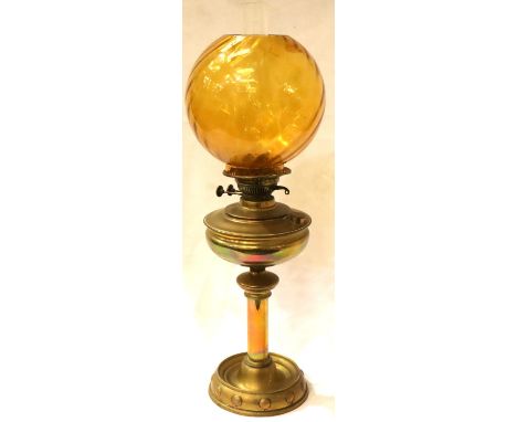 Large brass oil lamp with chimney and amber glass shade, H: 68 cm. Not available for in-house P&amp;P, contact Paul O'Hea at 