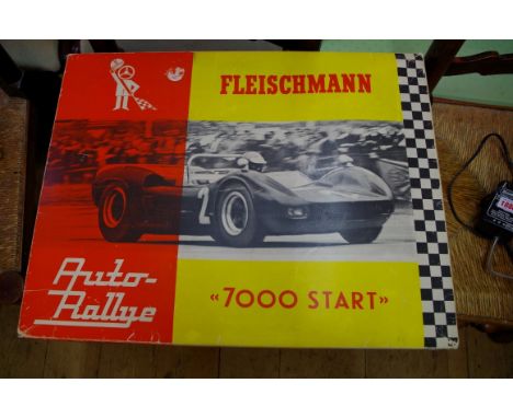 A circa 1960s Fleischmann boxed Auto Rallye '7000 Start', slot car 'Ford Lotus' racing set; together with associated adapter.