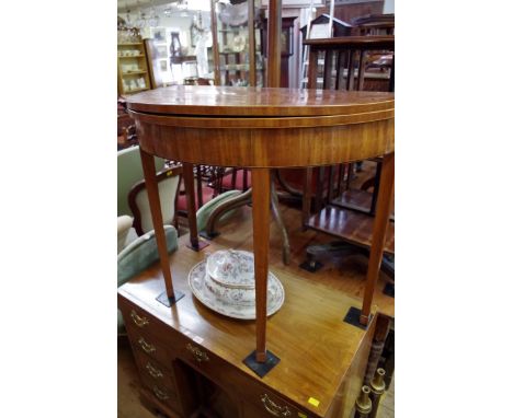 A George III mahogany and line inlaid demi-lune card table, 91.5cm wide.