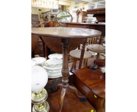 A George III mahogany circular tripod table, 49.5cm diameter, (formerly with tilt-top). 