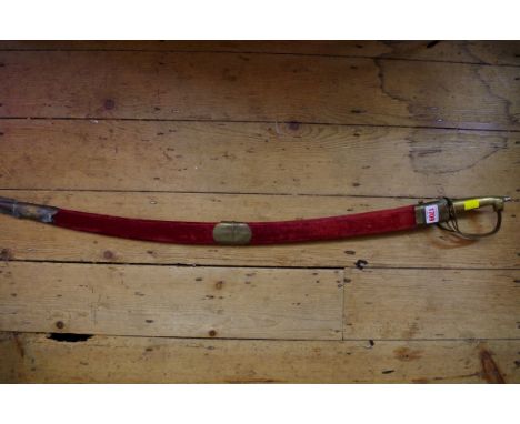 An Indian curved blade sword and scabbard. 
