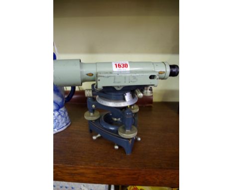 A Stanley surveyor's level, with folding tripod stand.