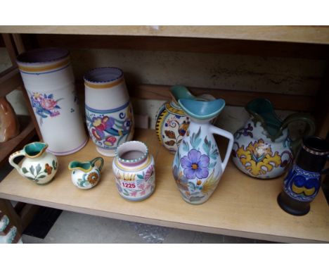 A small collection of Poole and Gouda pottery. 