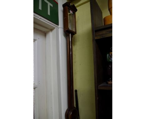 A reproduction mahogany chequer strung stick barometer, by Comitti & Son, 