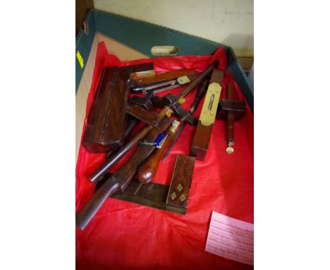A quantity of mahogany and rosewood woodworking tools, to include a mitre square, panel gauge, Marples level, chisels, mortic