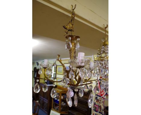 An old brass and faceted glass drop three branch ceiling light. 