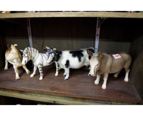 Four Melba ware animals. 