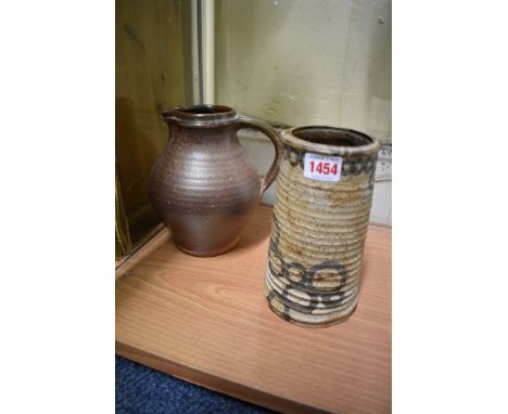 Studio Pottery:  a David Leach style vase, 19.5cm high; together with a Muchelney jug, 19.5cm high.