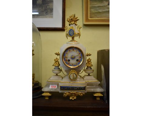 A late 19th century French alabaster and gilt mantel clock, striking on a bell, 38.5cm high. 