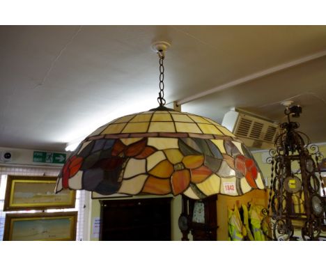 A Tiffany style stained and leaded glass ceiling light, 60.5cm diameter. 