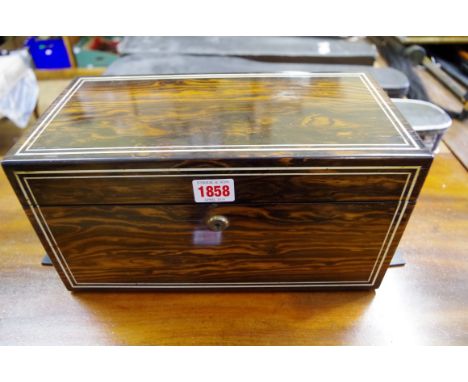 A coromandel tea caddy, the interior with the original cut glass mixing bowl, the gilt brass lock inscribed 'Toulmin & Gale',