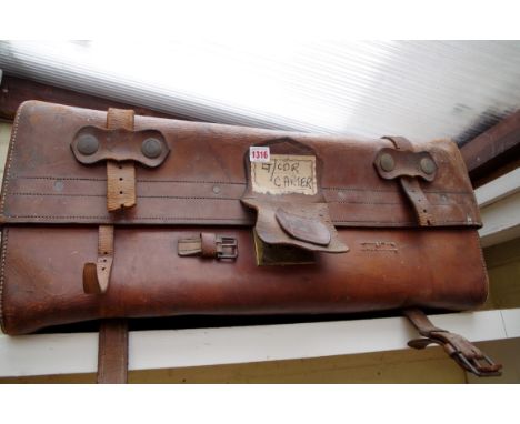 A vintage brown leather trunk, 76cm wide. 